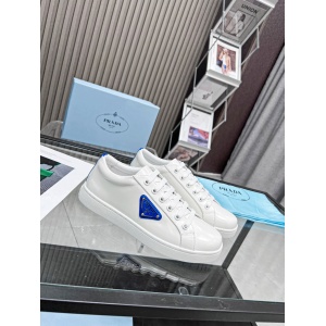 $89.00,Prada Enameled metal triangle logo Brushed Leather Low Top Sneaker Unisex # 265331