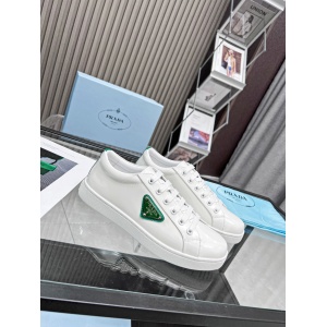 $89.00,Prada Enameled metal triangle logo Brushed Leather Low Top Sneaker Unisex # 265333