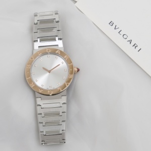 $125.00,Bvlgari 33 mm Lady watch in stainless steel and 18 kt rose gold # 299597